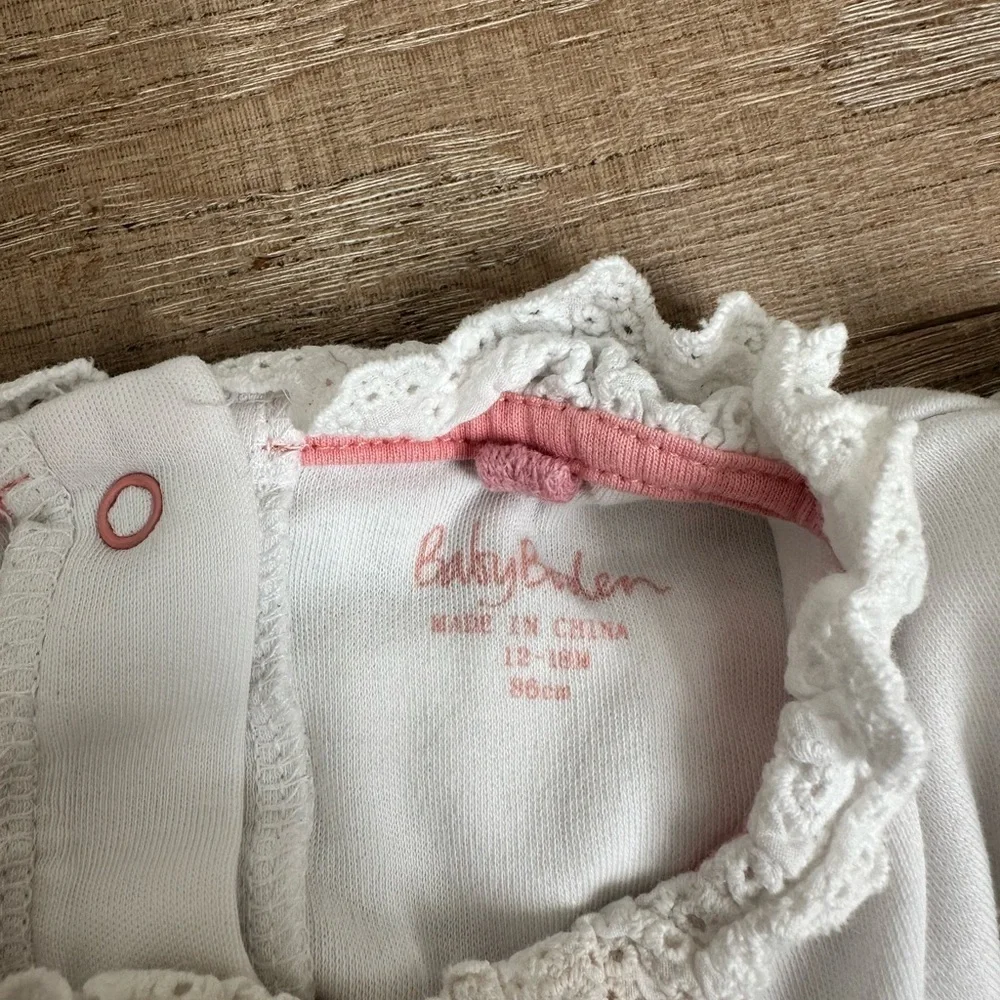 Baby Boden Cream Onesie with Pink Trim